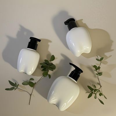 손 씻기용 압력 펌프와 함께 100-250ml 치아 모양 플라스틱 병 헤어 로션 손 위생제 사용자 지정 로고